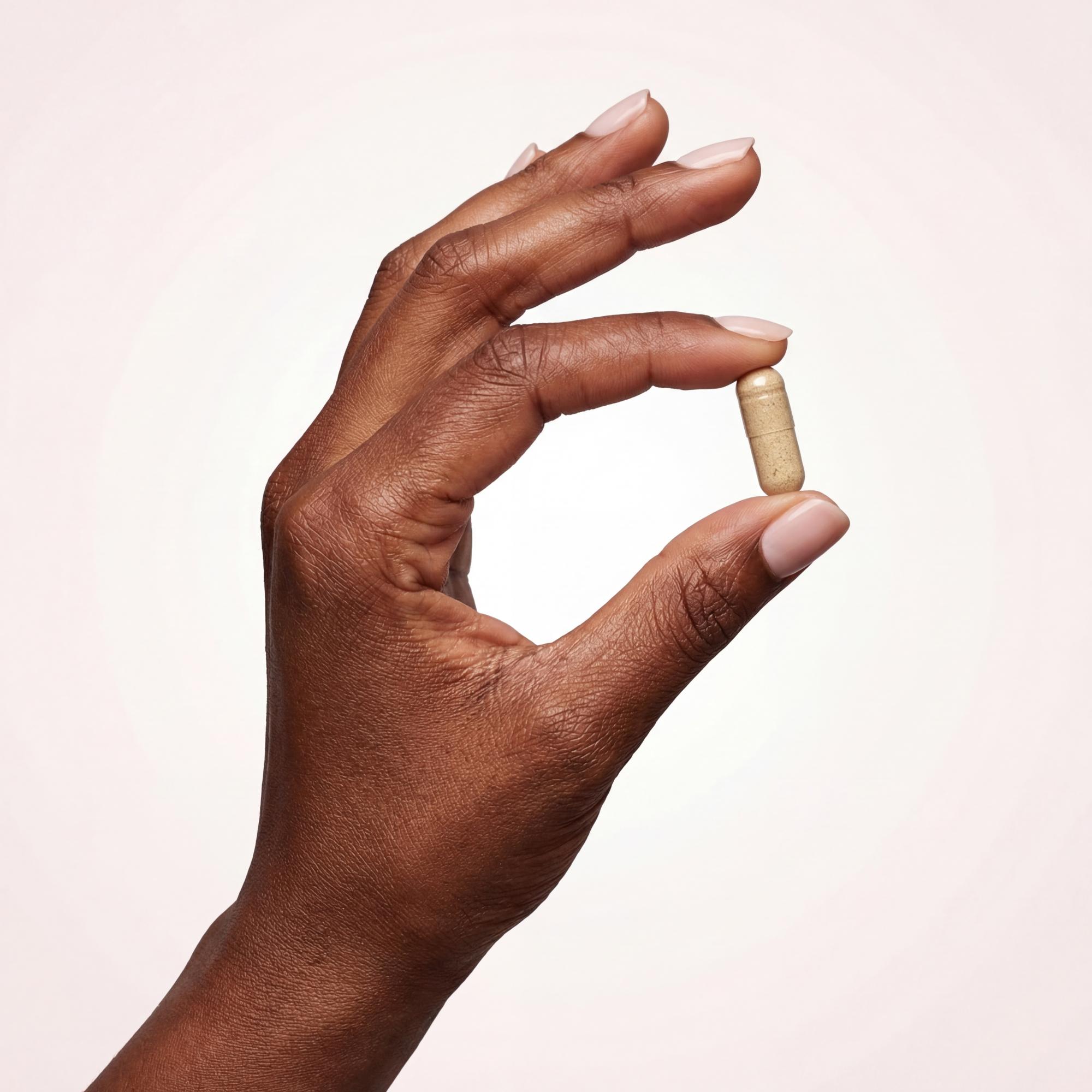 Guthealth caps in hand.jpeg